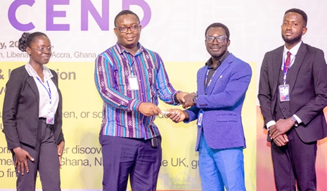 Tosin Adeoti (2nd from right), British Council, presenting the top prize honours to Dr Prince Odame, KNUST