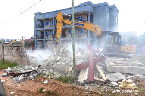One of the structures being demolished during the operation