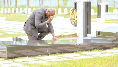 President Brice Clotaire Oligui Nguema paying homage to former President Jerry John Rawlings at the military cemetery President Brice Clotaire Oligui Nguema paying homage to former President Jerry John Rawlings at the military cemetery