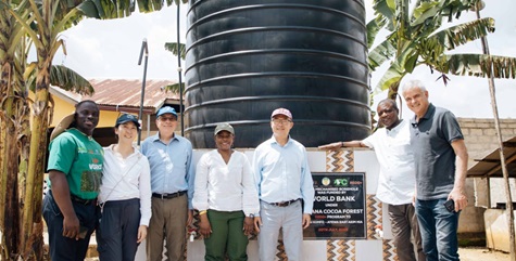 The World Bank Vice-President for Planet, Guangzhe Chen (3rd  right), with other members of the delegation, at one of the boreholes constructed for the Pano community under the GCRP.