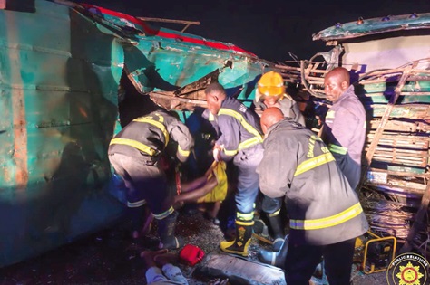 Personnel of the Ghana National Fire Service pulling out a victim from the wreckage Personnel of the Ghana National Fire Service pulling out a victim from the wreckage
