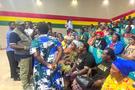 Michael Kpakpo Allotey, Chief Executive of the Accra Metropolitan Assembly, engaging with the traders