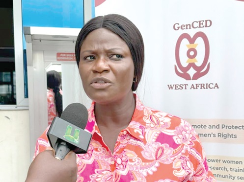 Esther Tawiah, Executive Director, GenCED, speaking to the media after the event