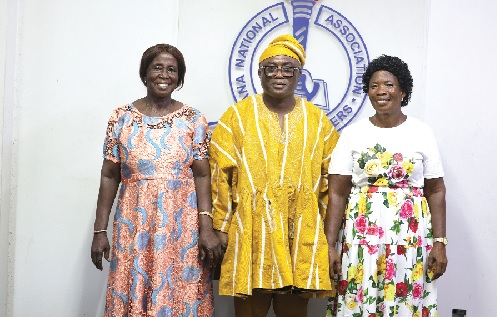 Madam Elizabeth Miah (left) and Madam Grace Ackah (right) with the General Secretary of Ghana National Association of Teachers, Mr Thomas Tanko Musah.