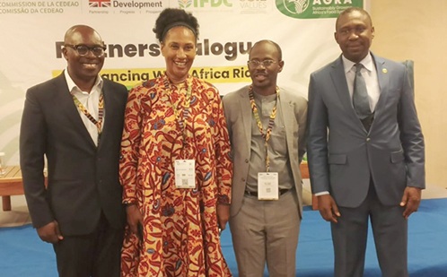 Dr Kalilou Sylla (right), ECOWAS Commissioner for Economic Affairs and Agriculture, with Natasha K. Quist (2nd from left), Director for West Africa at AGRA, and Traore Sy Alain (2nd from right), Director, Soil Values Project, IFDC, after the programme