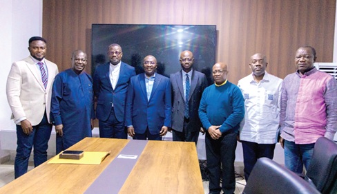 Dr Mahamudu Bawumia (arrowed) with members of the committee after receiving the report
