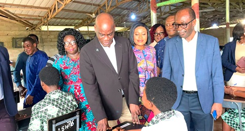 Haruna Iddrisu (2nd from left), Minister of Education, interacting with one of the candidates at Adonten Senior High School. With him are Prof. Ernest Kofi Davis (right), Director-General of GES, and Lawrencia Dziwornu (2nd from right), MP, Akuapem South 