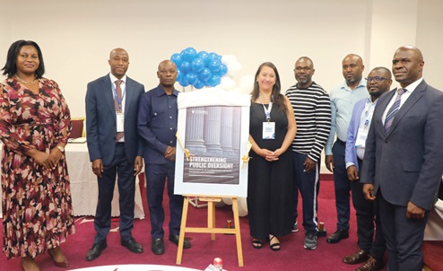 Samuel Nii Odartey Lamptey (3rd from left), Deputy Auditor-General in charge of Commercial Audit Department; with Daniela Patiño Piñeros (5th from right), Programme Lead Public Resources, Transparency International; Paul Banoba (right), Africa Regional Advisor Lead, African Union Engagement, and some dignitaries after launching the report. Picture: ELVIS NII NOI DOWUONA 