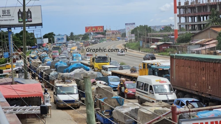 Tricycles compete with vehicles from the Kasoa-Accra section at Mangoline. Pictures: DOUGLAS ANANE-FRIMPONG &amp; ERNEST KODZI