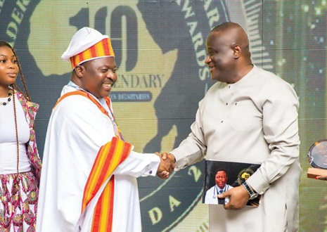 Ernest Yaw Amporful (right), Ghana’s Resident Envoy to Rwanda, presenting the Award for African Legend in Health to Dr De-Gaulle Moses Dogbatsey, CEO of the Medi-Moses Clinic and Prostate Centre
