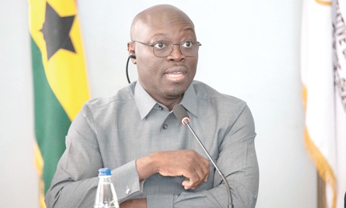 Dr Cassiel Ato Forson (inset), Minister of Finance, making a statement at the meeting