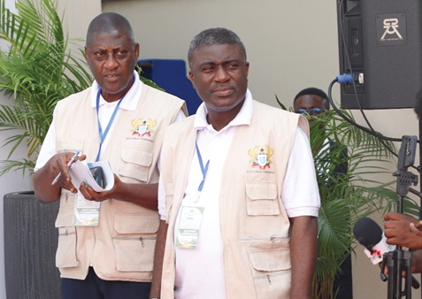 Samuel Tettey (left), Deputy Commissioner in charge of Operations and Dr Bossman Asare, Deputy Commissioner in charge of Corporate Services, EC