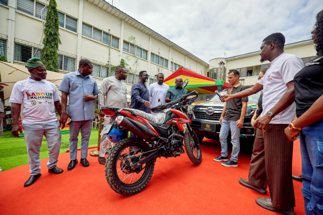 EEZZY Group Foundation donates tractor, pickup and 20 motorcycles for Farmers' Day