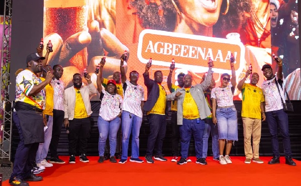 Mensah Seneadza (middle), Director, Franchise Operations, Coca-Cola Equatorial Africa on stage with some fans, influencers and Coca Cola executives during the kick-off of the event at the Ghud Park 