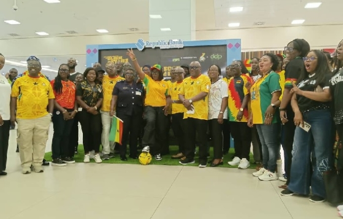 Mrs Yvonne Afriyie Opare (middle with arms raised) in group photograph with GACL staff and partners