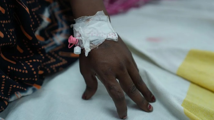 The mother of four young children was attacked in her own home and gang-raped by a group of men