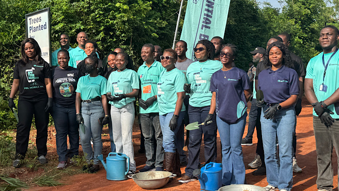 Staff of Prudential Bank Limited and officials of the Forestry Commission pose for a group photograph