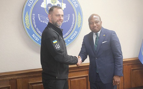 Brigadier General Dmytro Usov (left), Secretary of the Coordination Headquarters for the Treatment of Prisoners of War of Ukraine, with Samuel Okudzeto Ablakwa (right), Minister of Foreign Affairs, after the presentation at the Coordination Headquarters for the Treatment of Prisoners of War in Kiev, Ukraine