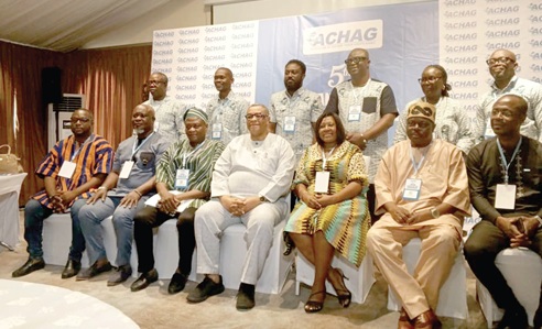 Augustus Tanoh (middle), Presidential Advisor on the 24-Hour Economy, with dignitaries and executive members of ACHAG at the 5th AGM of ACHAG