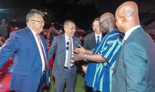 Eric Opoku (2nd from right), Minister of Food and Agriculture, interacting with Tang Hong (left), Chairman, Ghana Association of Chinese Societies, and Li Yang  (2nd from left), acting Chinese Ambassador to Ghana, at the lantern festival