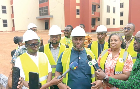 Kenneth Gilbert Adjei, Minister of Works, Housing and Water Resources, speaking to journalists after the tour of the Tema Community 22 NHF Housing Project Phase 3 site