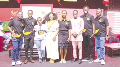 Aurelia Baaba Ofori Odame (4th from left), Head, Afro-Asian Banking and State-Owned Enterprises, GCB Bank; Cynthia Ofori-Dwumfuo (4th from right), Chief Marketing Communications and Customer Experience Officer, GCB Bank, and other staff at the event