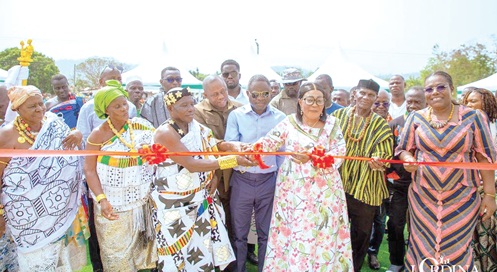 Lordina Dramani Mahama (3rd from right), First Lady and President of the Lordina Foundation,  cutting the tape to inaugurate the health facility