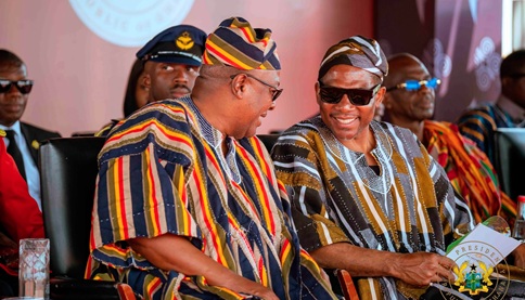  Terrance Michael Drew (right), Prime Minister of Saint Kitts and Nevis, in a discussion with President John Dramani Mahama