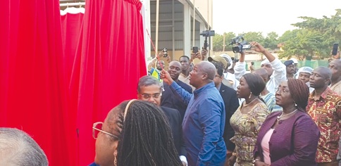 President John Dramani Mahama unvailing a plaque to officially inaugurate the new pasta factory