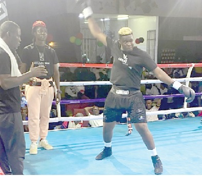 Abu Kamoko celebrating his first-round victory over David Okine