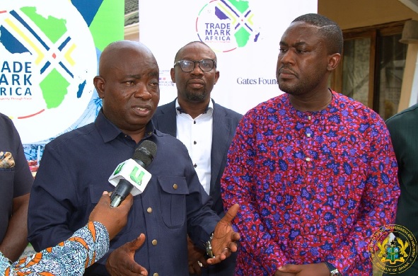  Sampson Ahi, Deputy Minister for Trade, Agribusiness and Industry, speaking at the event. With him is Kwamina Ekremet,  Program Manager for West Africa and AfCFTA, TradeMark Africa