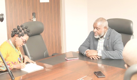 Prof. John Humphery Amuasi (right), Leader, Global Health and Infectious Diseases Research Group, Kumasi Centre for Collaborative Research in Tropical Medicine, explaining a point to Augustina Tawiah, a reporter with the Daily Graphic, during an interview Picture: EDNA SALVO KOTEY