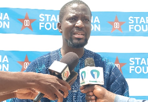 Inset: Ibrahim Mahama, Founder of the Savannah Centre for Contemporary Art (SCCA), Red Clay Studio, engaging with the media at the event,  A section of the participants