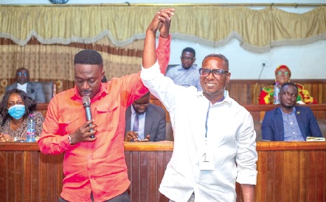 David Mensah Odoom (right) being declared as the Presiding Member-elect for Obuasi Municipal Assembly by Ebenezer Osei Tutu, the Municipal Electoral Officer of the Electoral Commission.