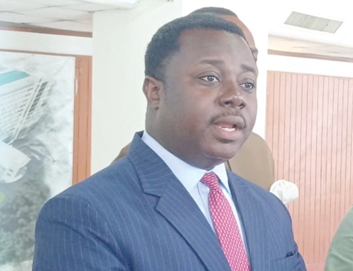 Rev. John Ntim Fordjour, Ranking Member on the Defence and Interior Committee of Parliament,  addressing the media