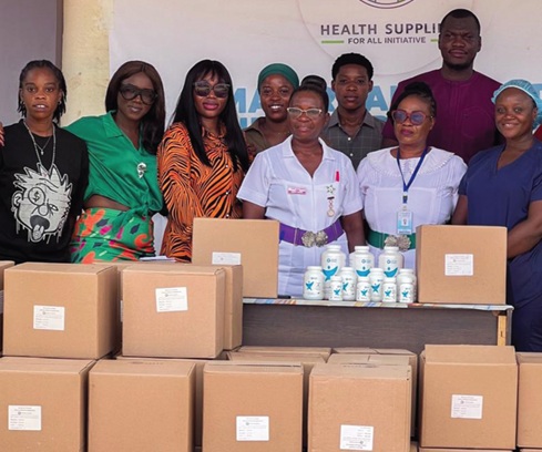 Urica Dufe (2nd from left), the Ambassador for Special Initiatives, Josephine Joh (3rd from left), Chairperson, Associate Patrons Circle, Salomey Tetteh Frimpong (3rd from right), Deputy Chief Nursing Officer, Diana Ohene-Obeng (2nd from right), Principal Midwifery Officer, and Isaac Atseku (back row: right), Executive Director, Health Supplies for All Initiative, after the presentation