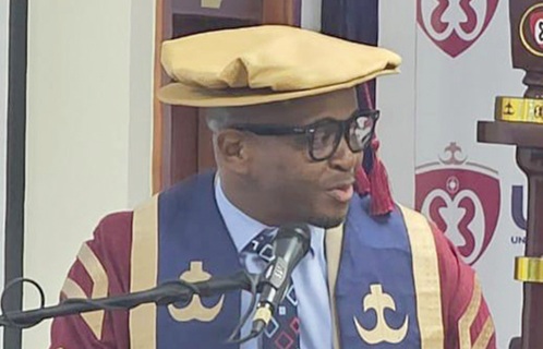 Prof. Eric Opoku Mensah (left), Vice-Chancellor of UniMAC, addressing the graduates