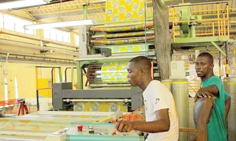 Some Ghanaian youth engaging in factory activity