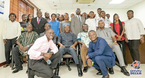 Alexander Afenyo-Markin (seated middle), the Minority Leader,  with some of the members of the Minority Caucus and student leaders