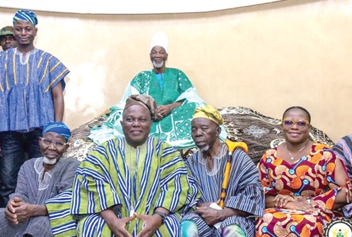 Dr Nii Moi Thompson (seated 2nd from left), Chairman of the NDPC, and Dr Audrey Smock Amoah (right) with Ya-Na Abukari II (arrowed) and his elders at Gbewaa Palace