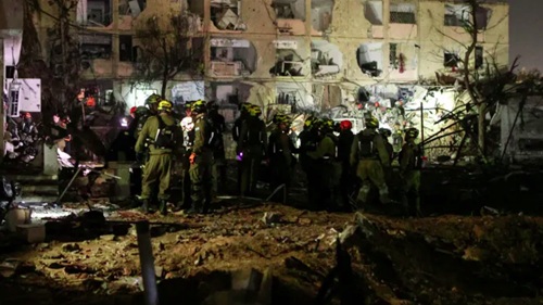 Iran strikes towns near Israel’s key nuclear site, at least 180 wounded