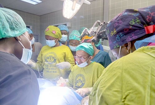 Professor Abdulkareem K. Al-Balasi (arrowed), Senior ENT and Cochlear Implant Consultant of the Faculty of Medicine, Dhamar University, Yemen, leading the team from the ENT Department of the Korle Bu Teaching Hospital to conduct the cochlear Implant surgery on one of the children