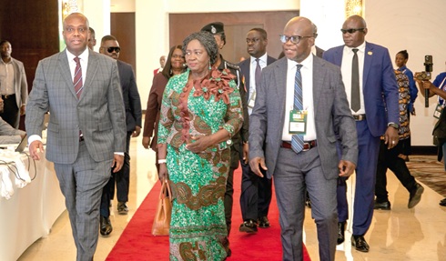 Vice-President Prof. Naana Jane Opoku-Agyemang (2nd from left) arriving at the conference in the company of Thomas Nyarko Ampem (left), Deputy Minister of Finance, and Prof. Michael Kpessa-Whyte (right), Director-General, SIGA