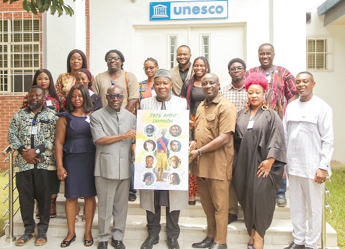 Edmond Moukala (middle), UNESCO Representative to Ghana, with Ivor Agyeman-Duah (3rd from left), Director of the Manhyia Palace Museum, Divine Owusu-Ansah (3rd from right), Director of Arts &amp; Culture at the Ministry of Tourism, Arts and Culture, and other officials after the event. Picture: CALEB VANDERPUYE