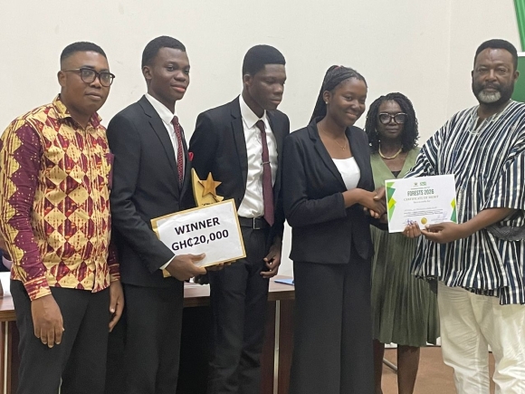 TEAM UPSA receiving their Prize after emerging winners of the Forest Day debate contest