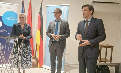 Professor Juliane Winkelmann (left) from the Technical University of Munich and Head of Delegation, speaking while Dr Kai Sicks (middle), the Secretary General of DAAD, and Frederik Landshoft (right), the German Ambassador to Ghana, look on