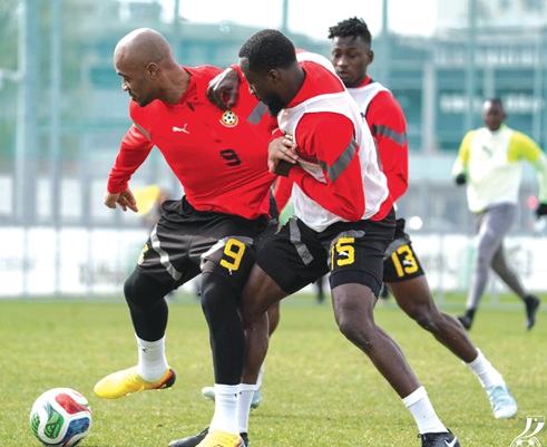 Black stars captain Jordan Ayew vying with Elisha Owusu (right) for the ball during the team’s training yesterday