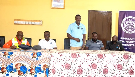 David Kwasi Afezame (standing) addressing the participants in the ceremony 