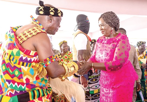 Nana Mprah Besemuna III (left), Krachiwura, welcoming Prof.  Naana Jane Opoku-Agyemang, the Vice-President, to the durbar ground