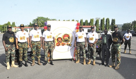 Brigadier General Selorm Kwasi Amengor (4th from left), Brigade Commander, Lieutenant Colonel Jalali Din Ibrahim (4th from­ right) and some officers by the anniversary logo